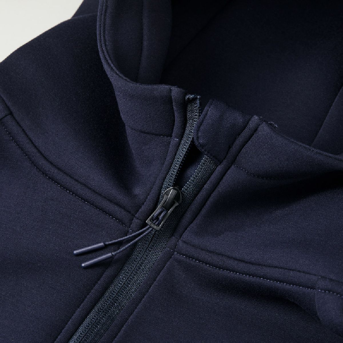 Chin guard design to protect your chin, single slider zipper design, and zipper tab on the pull