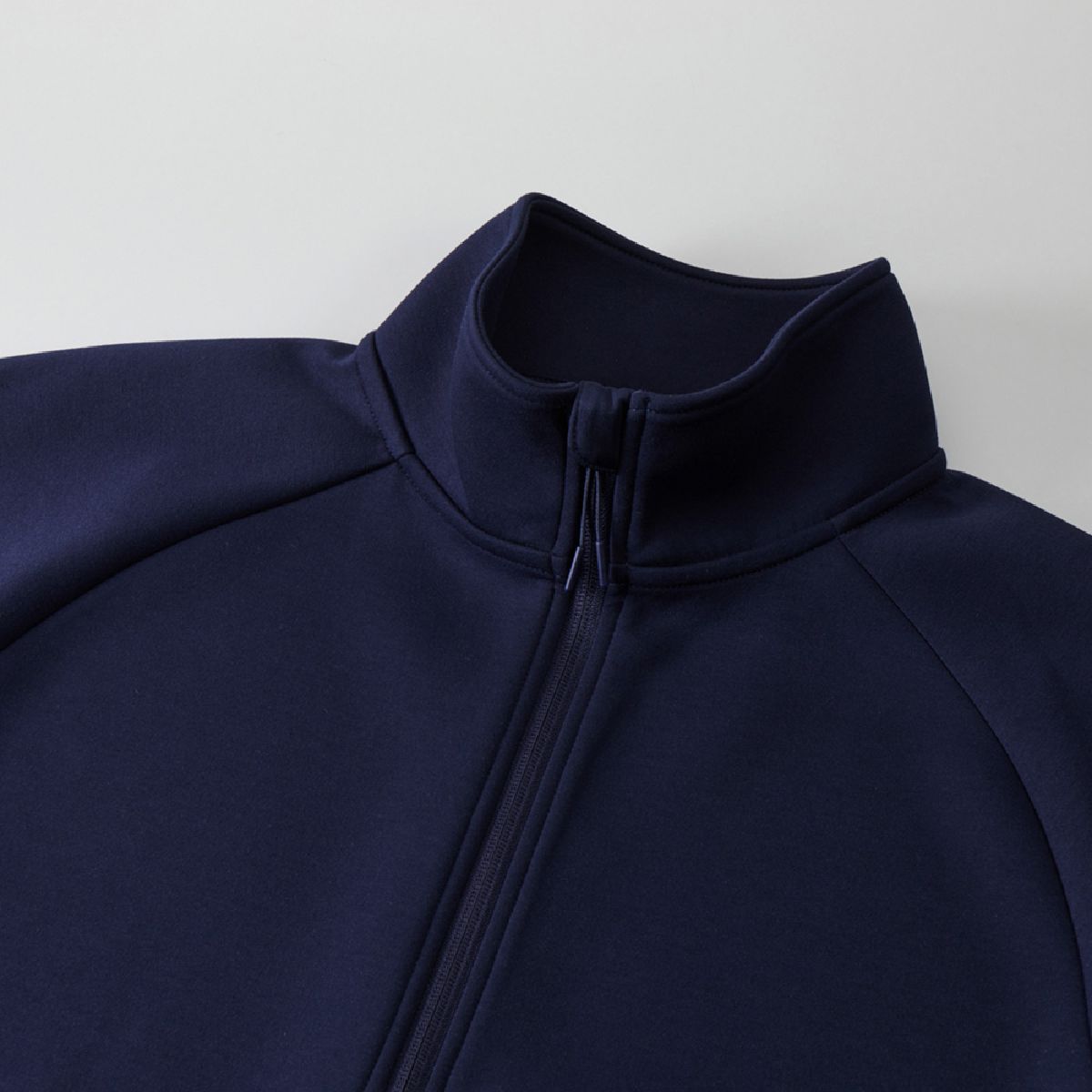 The collar is high neck design that prevents wind from entering