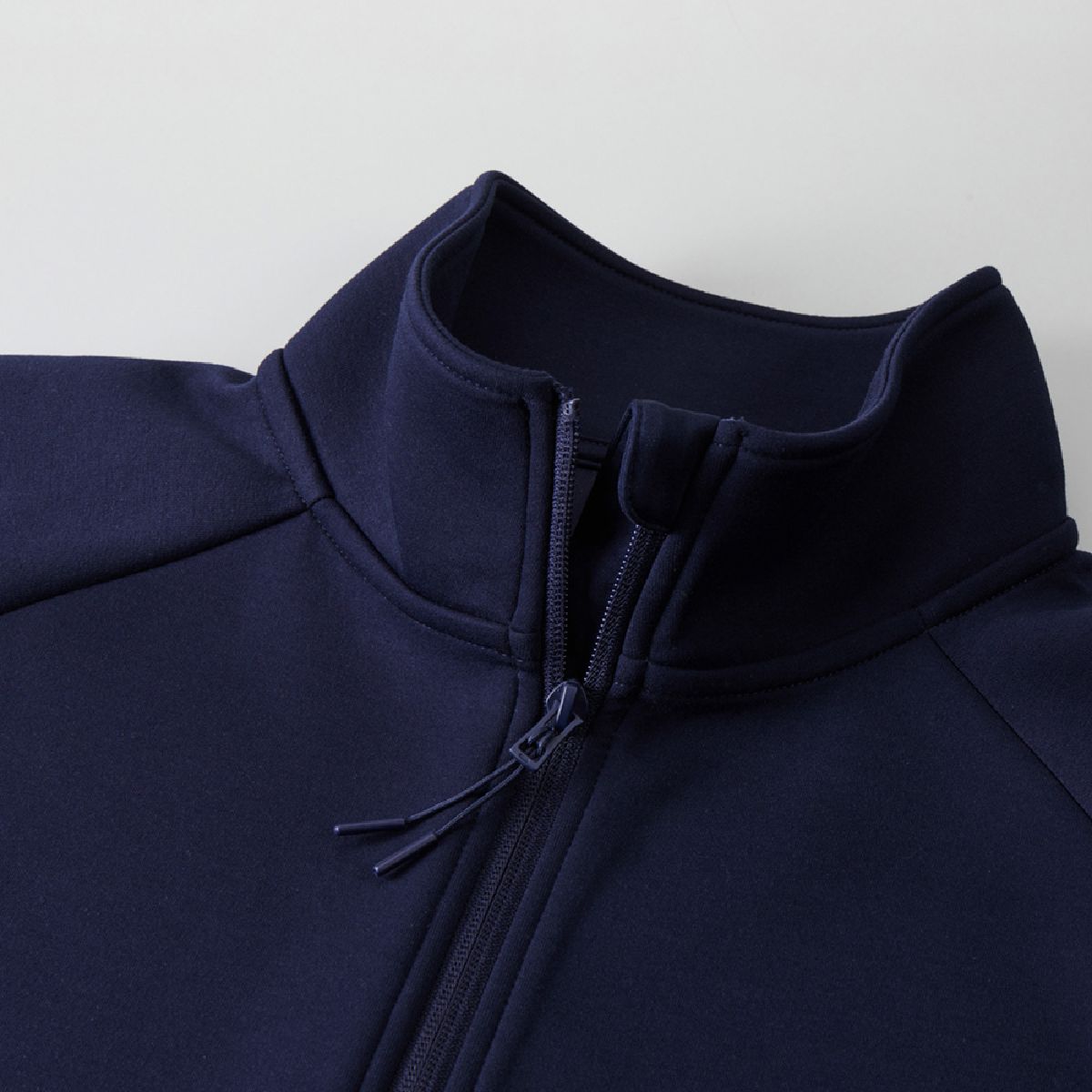 Chin guard design to protect your chin, single slider zipper design, and zipper tab on the pull