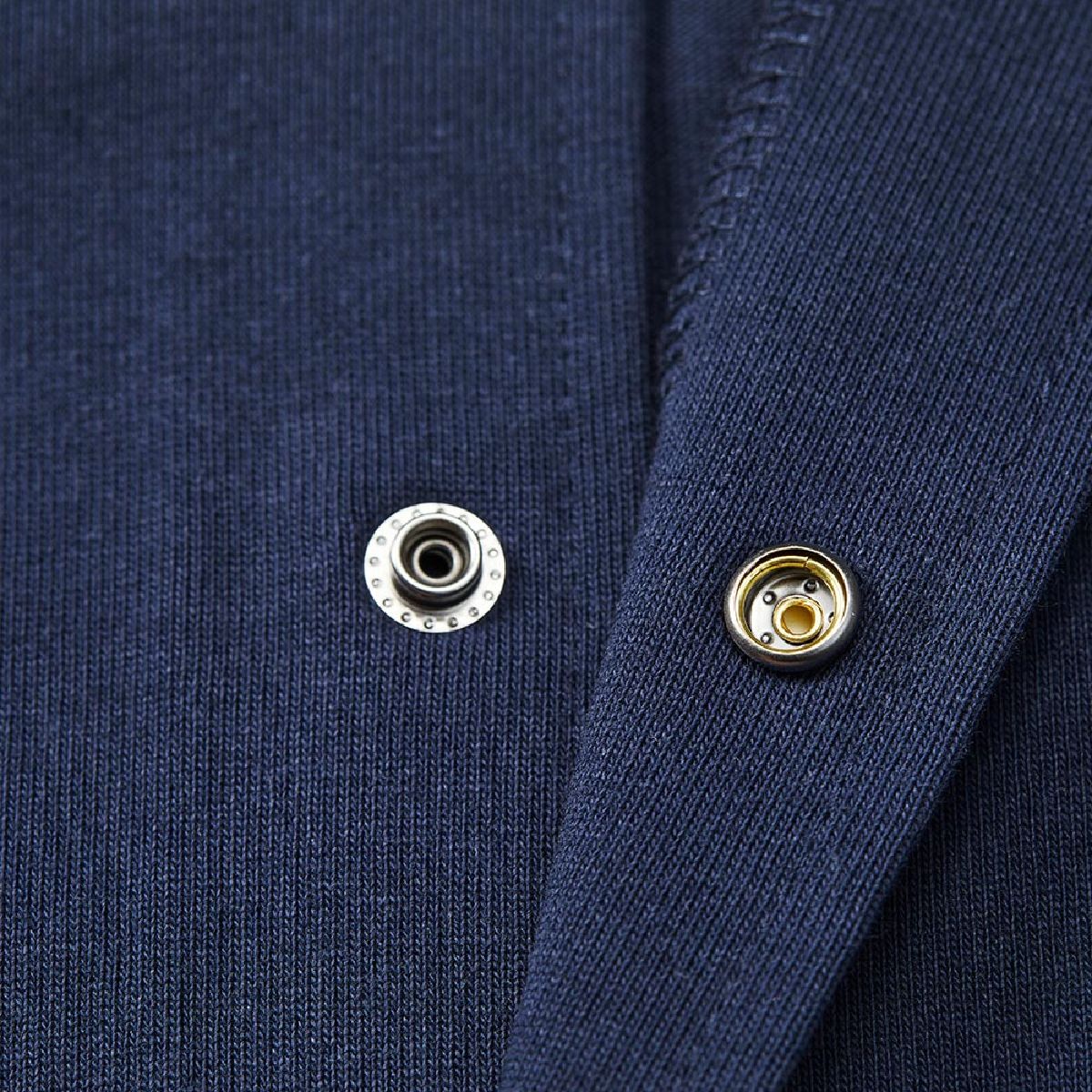 The dot button is a metal American type