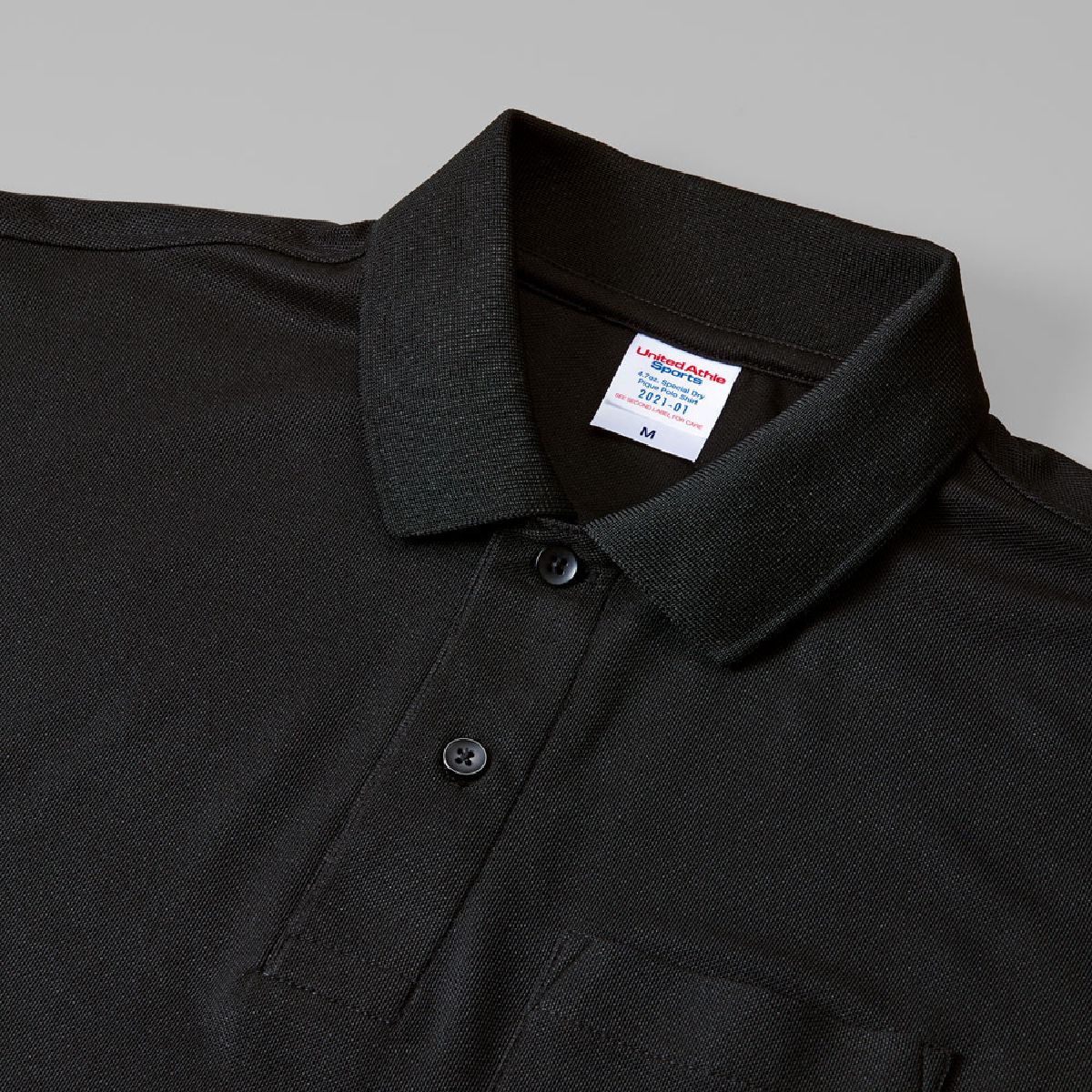 The black and navy use glossy buttons in the same color as the body.
