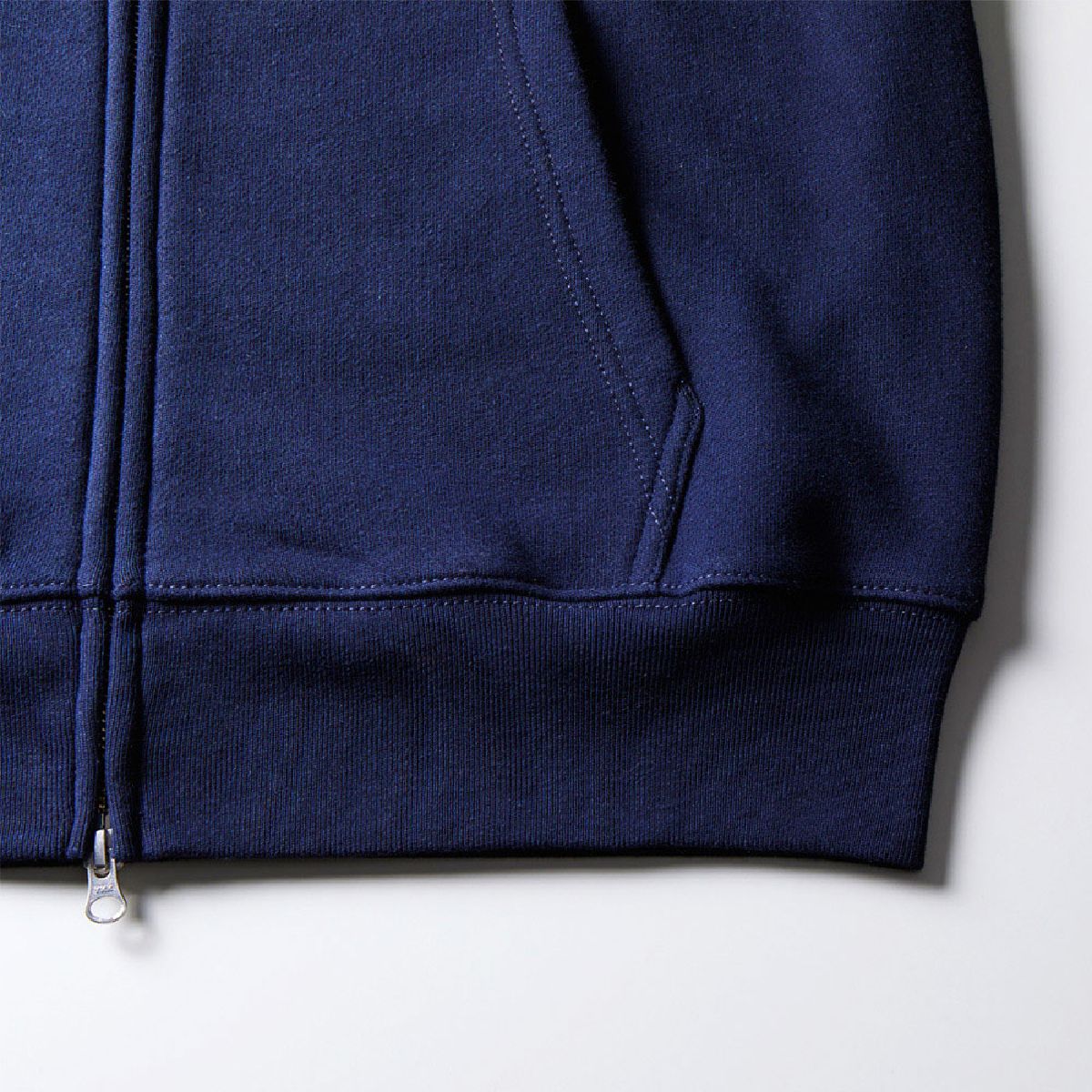 The ribs at the hem and the seam line of the body are durable double stitching