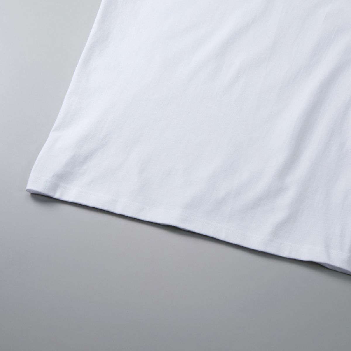 The hem is finished with a double needle stitch.