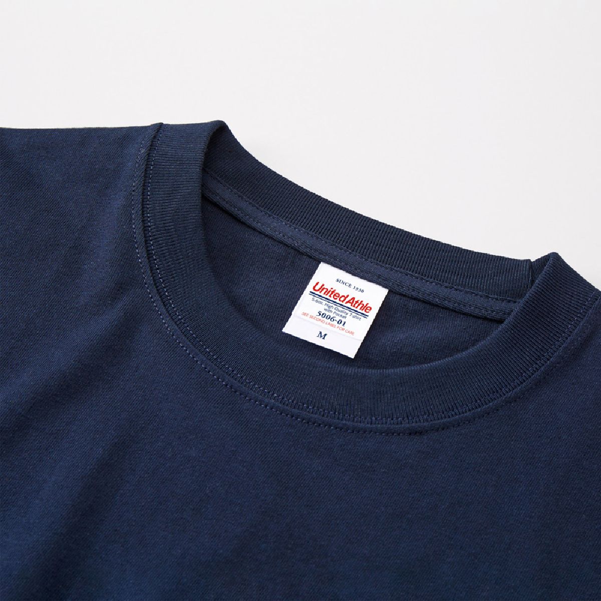The neck ribbing is finished with durable double stitching.