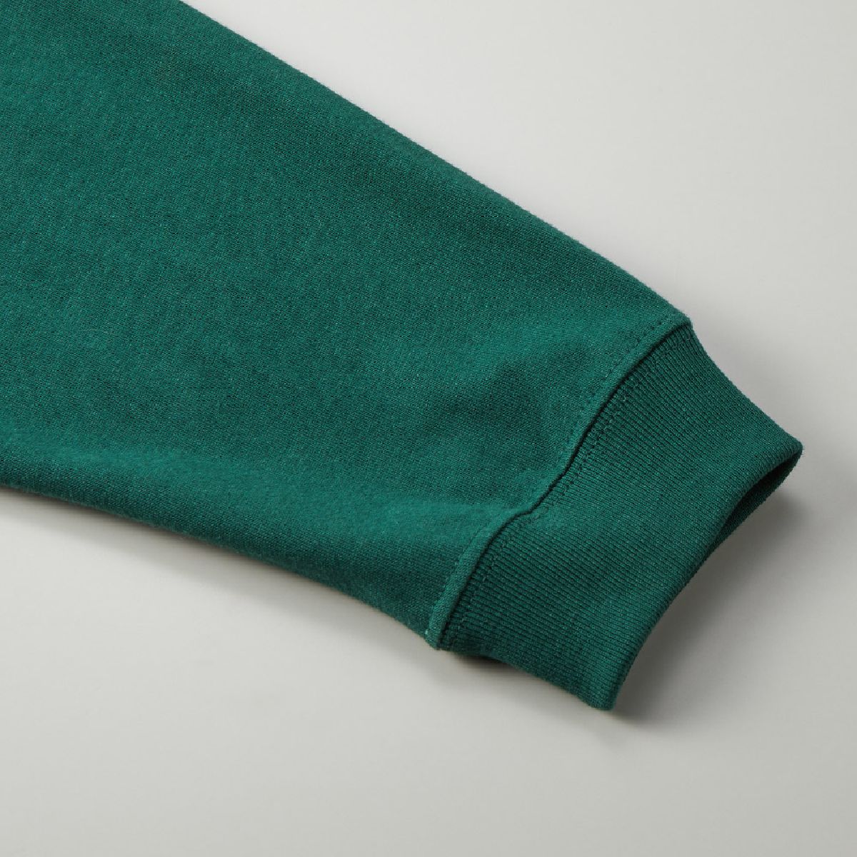 1.6 inch wide ribbed cuffs, double needle stitching at seam line
